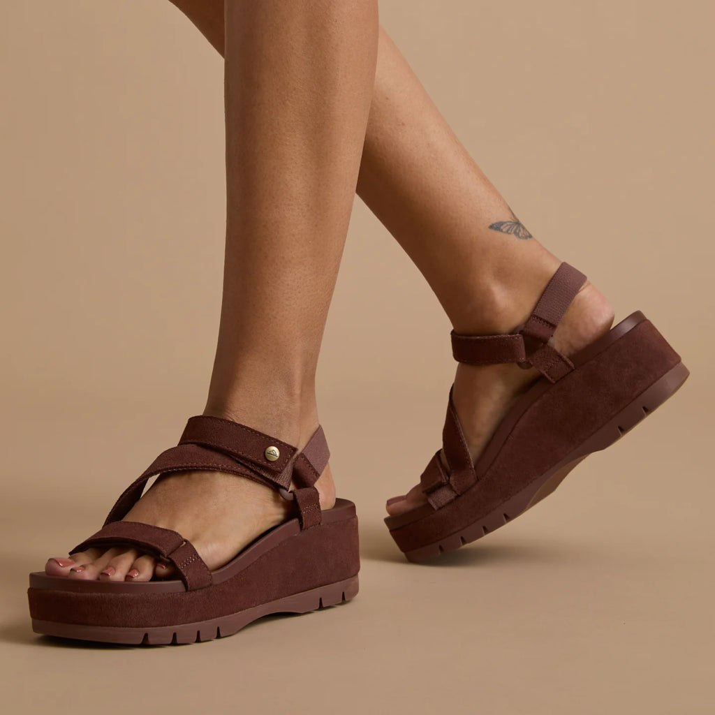 Vista Higher Luna women's brown platform sandals facing left, close-up on footbed and straps, beach-inspired comfort.
