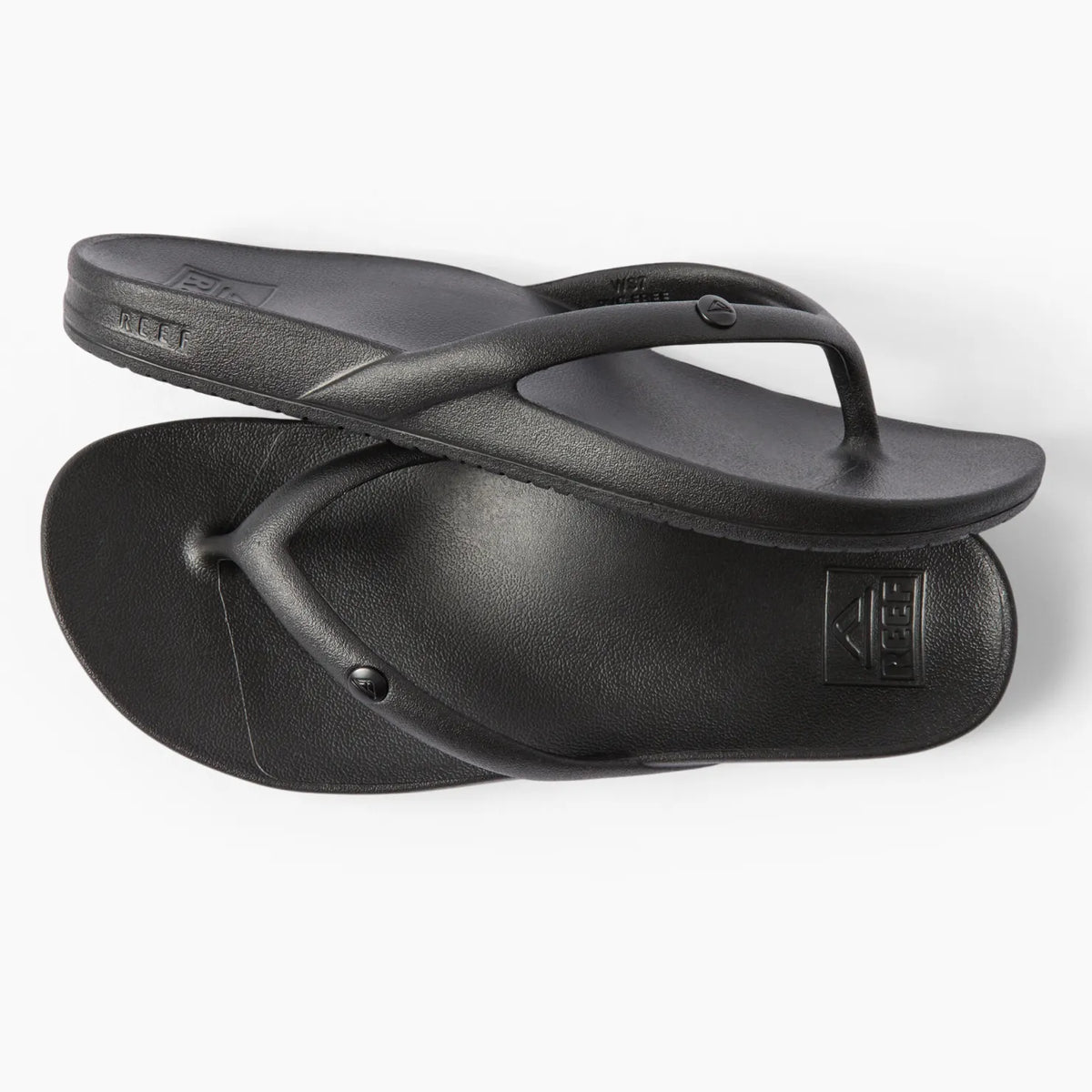 Vista Vay-Cay black flip flops for women, top view showing toe post and cushioned footbed, surf-inspired comfort design.