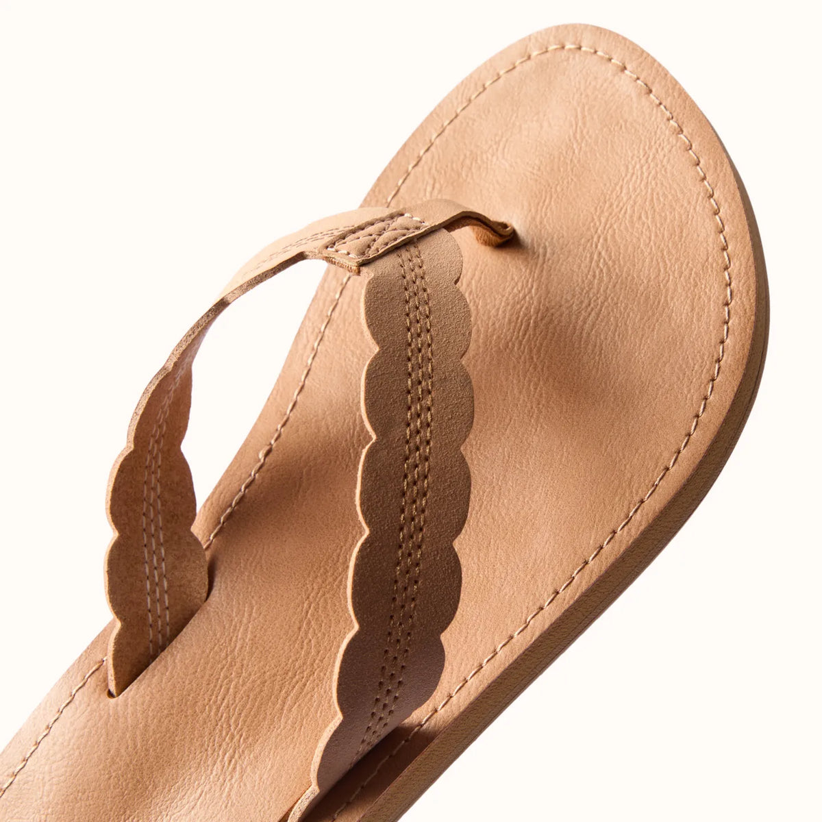 Reef Celine x Jenny women's tan sandal top view showing soft scalloped straps and molded cushioned footbed for beach comfort