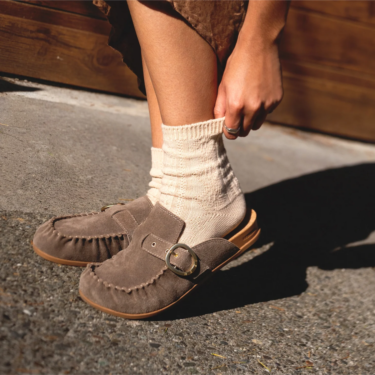 Vista Siena facing left, women's driftwood suede clog with buckle, cushioned footbed, and anatomical arch support for comfort.