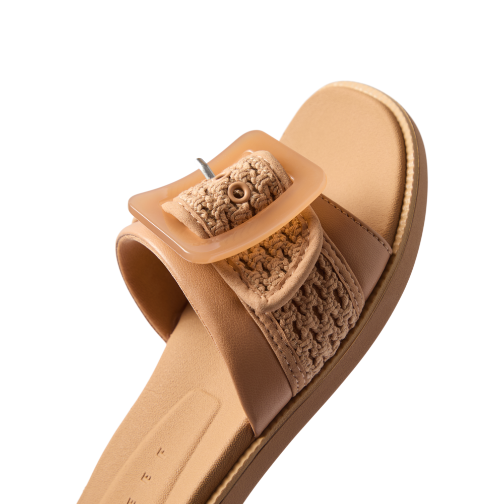 Sunny Emma left sandal facing right showing close-up of natural textile upper with buckle and cushioned footbed