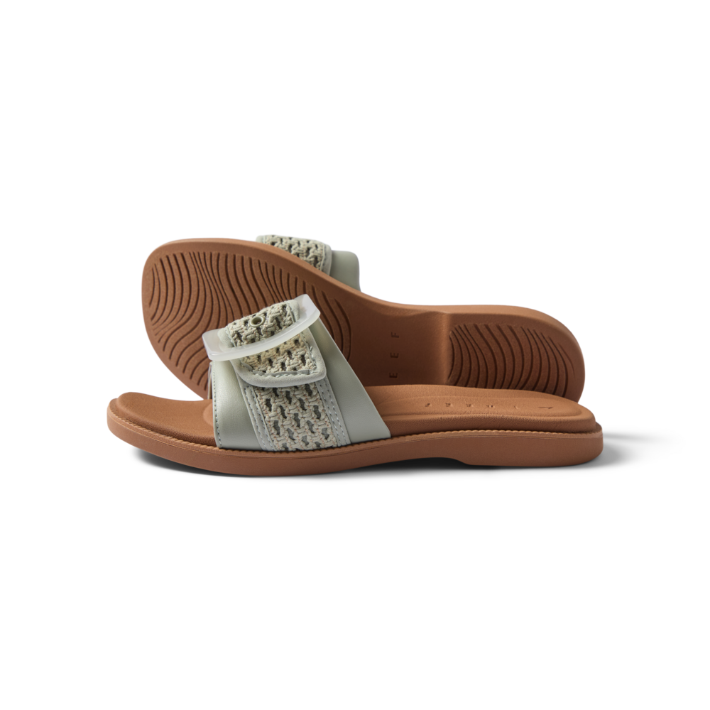 Side view of women's Sunny Emma sandals in sage textile with soft cushioning and arch support, facing left, beach-inspired design.