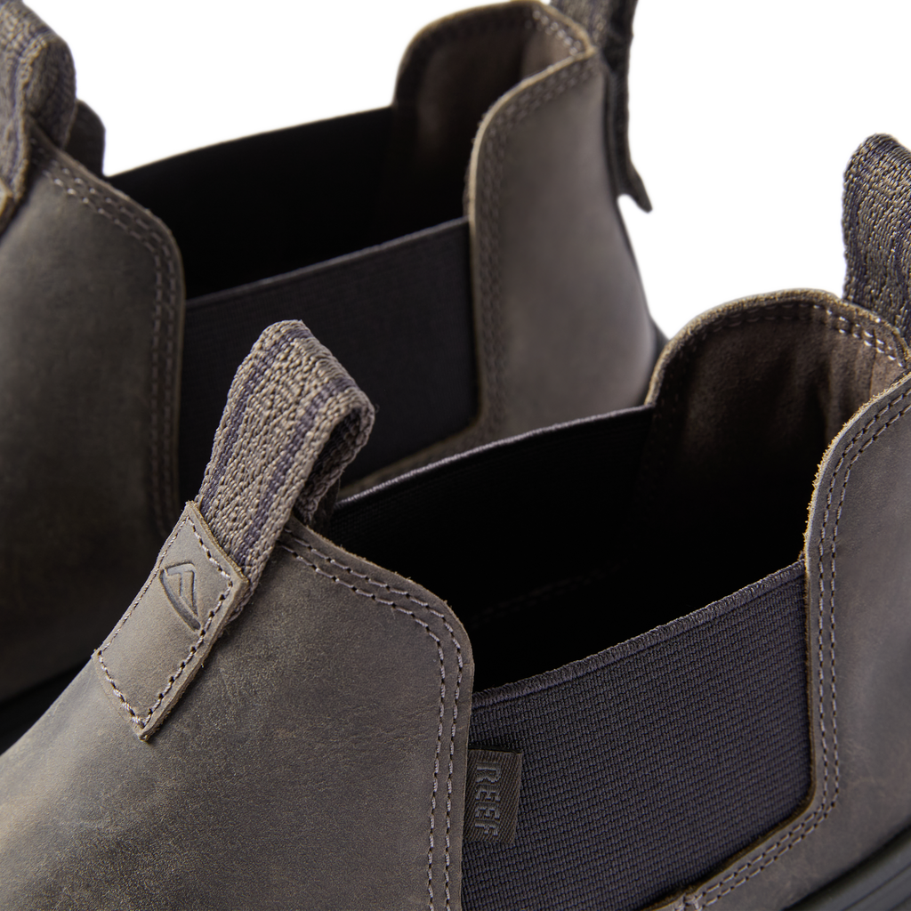 Close-up of the upper front section of the black Evo men’s shoe facing left, featuring comfort and durable design.