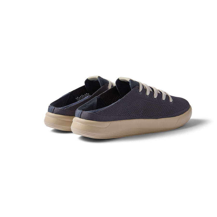 Neptune men's beach-inspired shoes in true navy, left side view showing lightweight upper and cushioned sole for all-day comfort.
