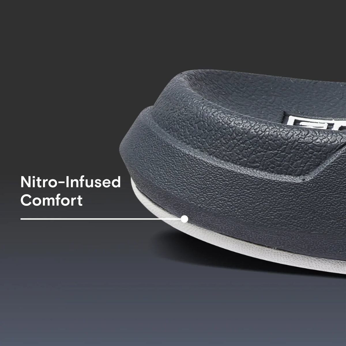Close-up of the front part of the Cruiser footwear facing left, showing textured surf-inspired design and comfort cushioning.