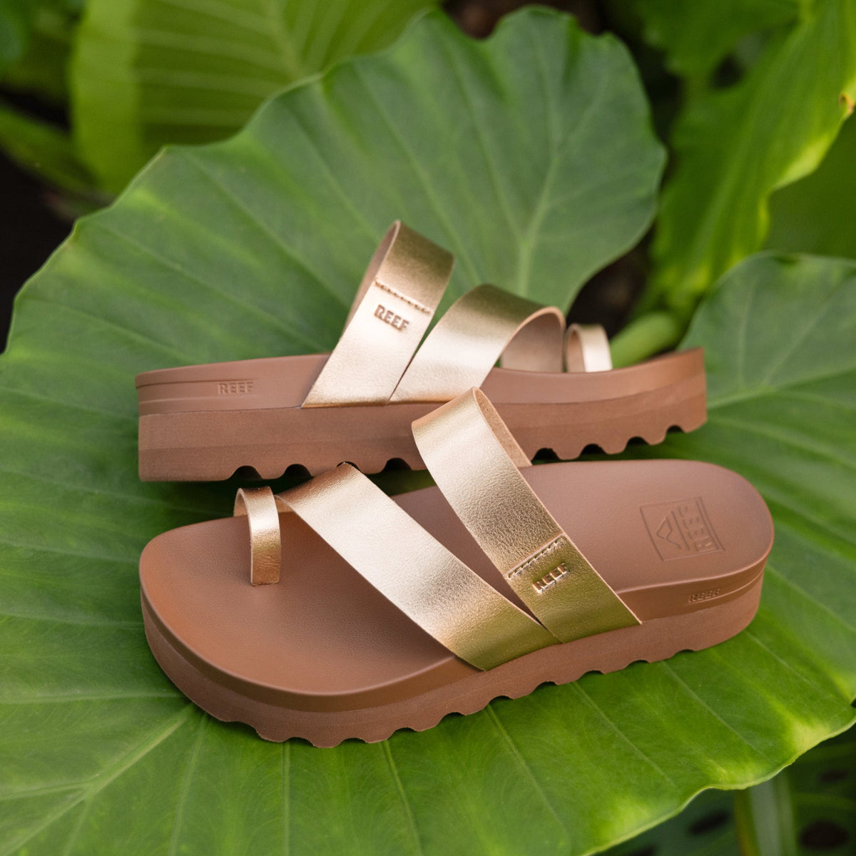 Vista Hi Layla women's sandals with gold straps facing left, featuring arch support and soft cushioning for beach comfort.