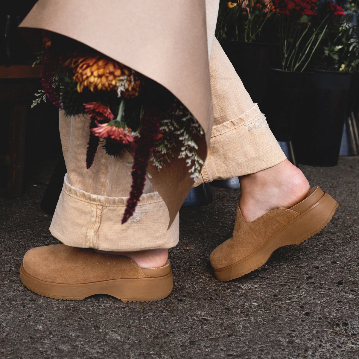 Side view of women's Vista Skye platform clogs in tan suede, showcasing sustainable design and comfortable arch support.