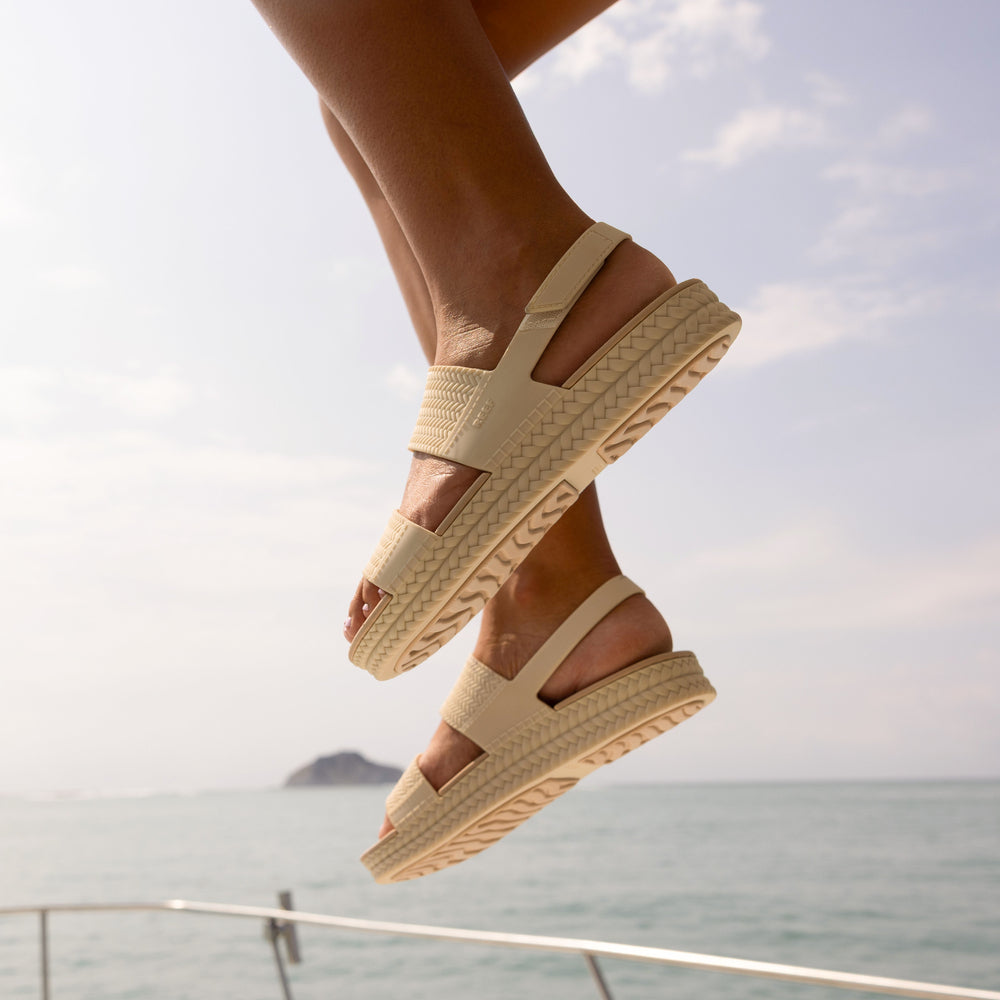 Reef Water Vista sandals facing right, close-up of water-friendly beige platform sandals with textured soles.