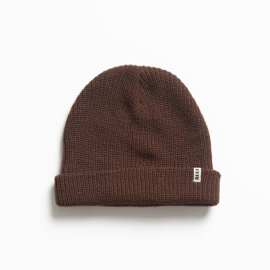 Alyx Beanie in brown knit fabric, close-up front view showing soft texture, designed for comfort and beach lifestyle.