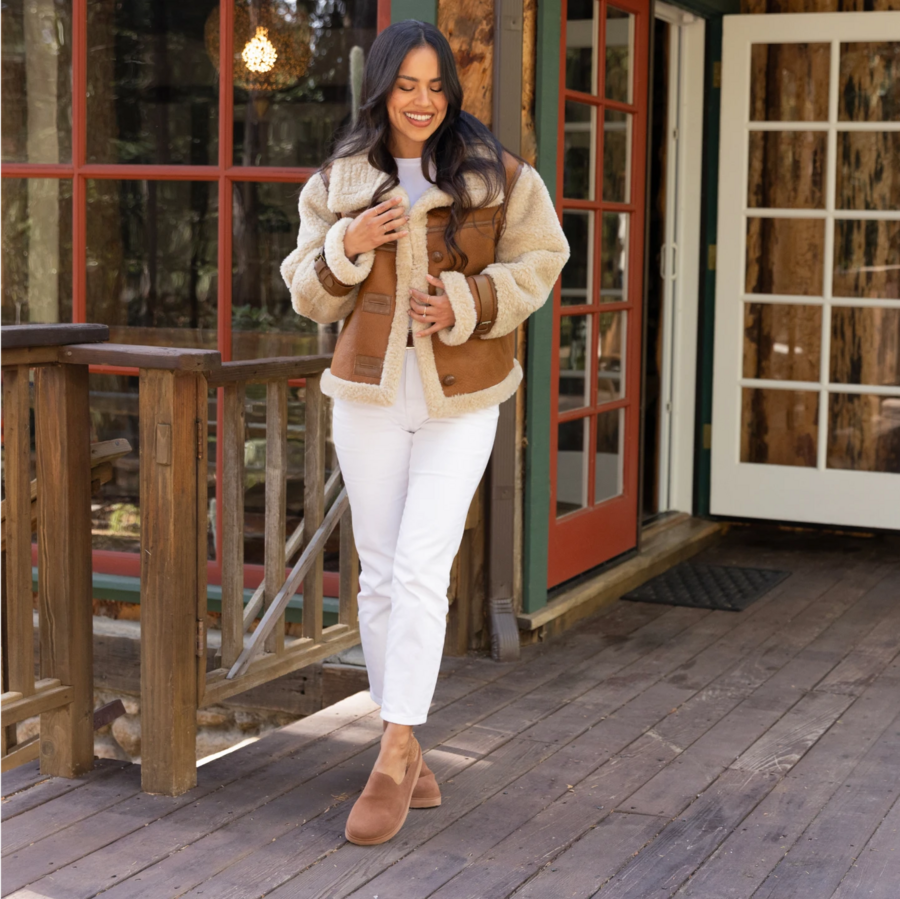 Woman wearing Vista Skye clogs facing forward, showcasing soft-rebound cushioning and comfort for active beach lifestyles.